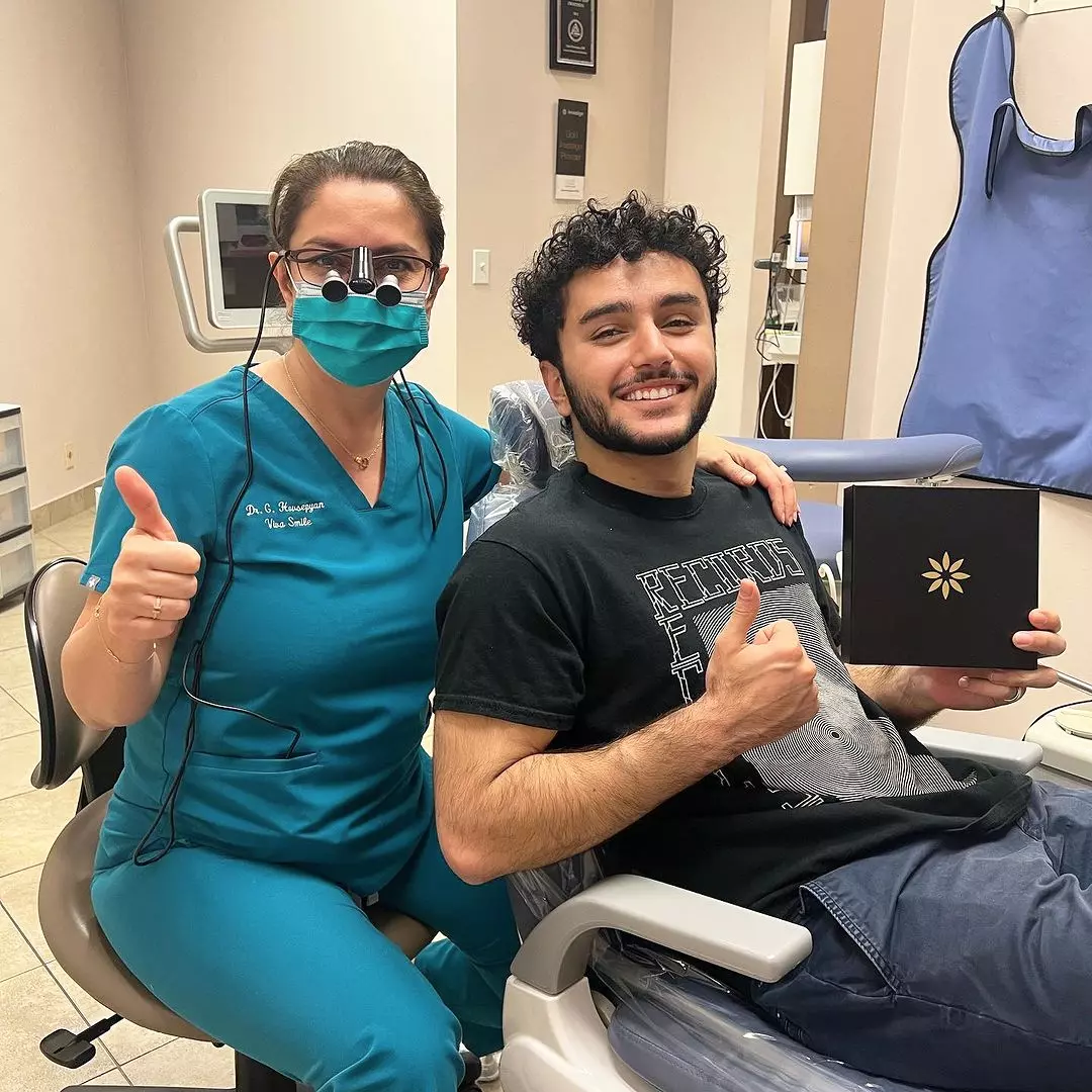 Dr. Hovsepyan With an Invisalign Patient Giving the Thumbs Up